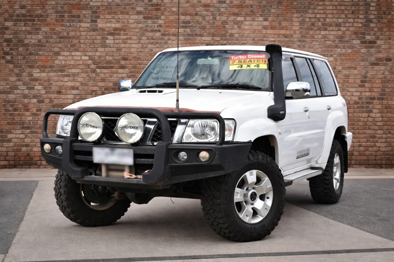Image of a 2012 Nissan Patrol GU VII ST (4x4) White 5 Speed Manual Wagon