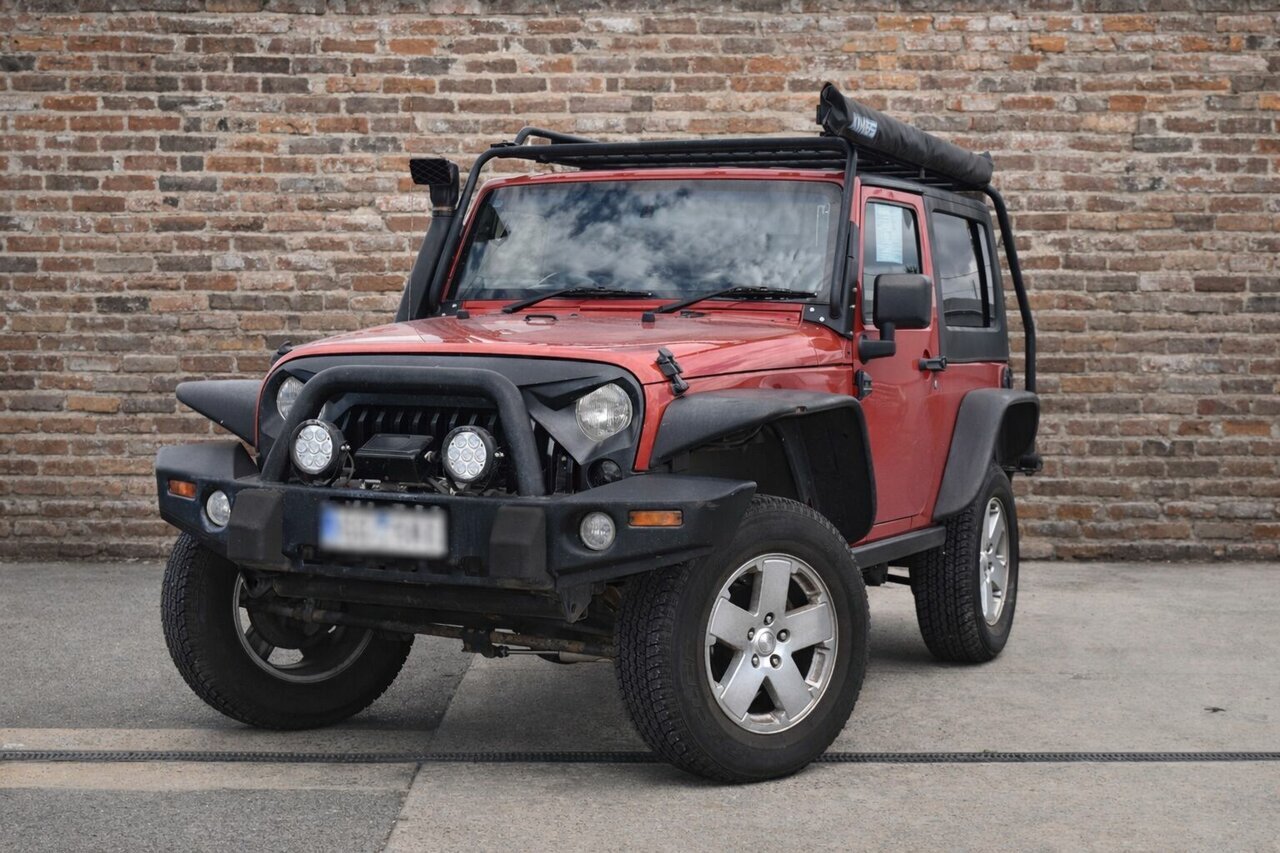 Image of a 2007 Jeep Wrangler JK Sport (4x4) Red 6 Speed Manual Softtop