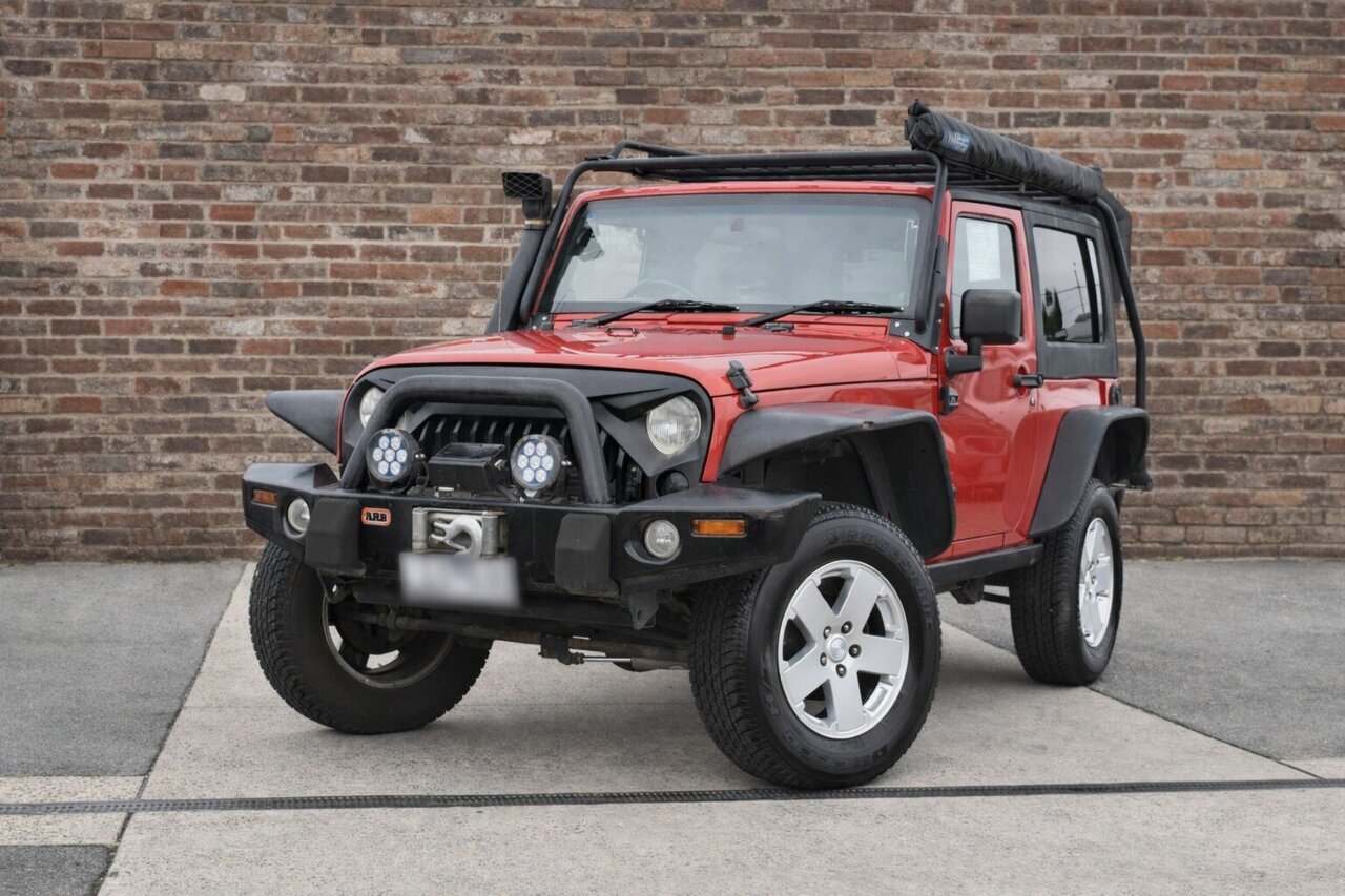 Image of a 2007 Jeep Wrangler JK Sport (4x4) Red 6 Speed Manual Softtop