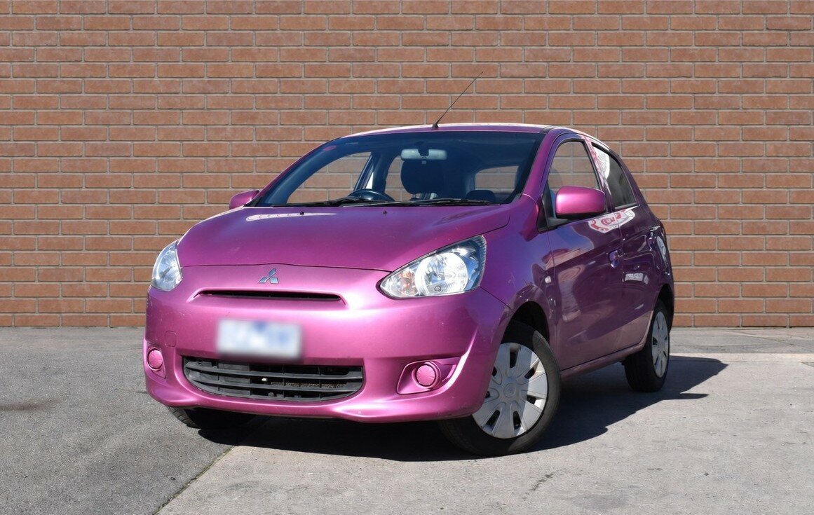 Image of a 2014 Mitsubishi Mirage LA ES Pink 5 Speed Manual Hatchback